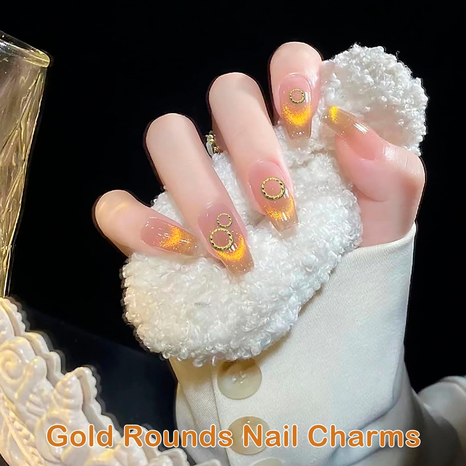 Close up look of the two different sizes including three millimeter and five millimeter hollow gold metal studs.