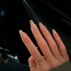 Close-up of 3mm and 5mm gold nail art charms