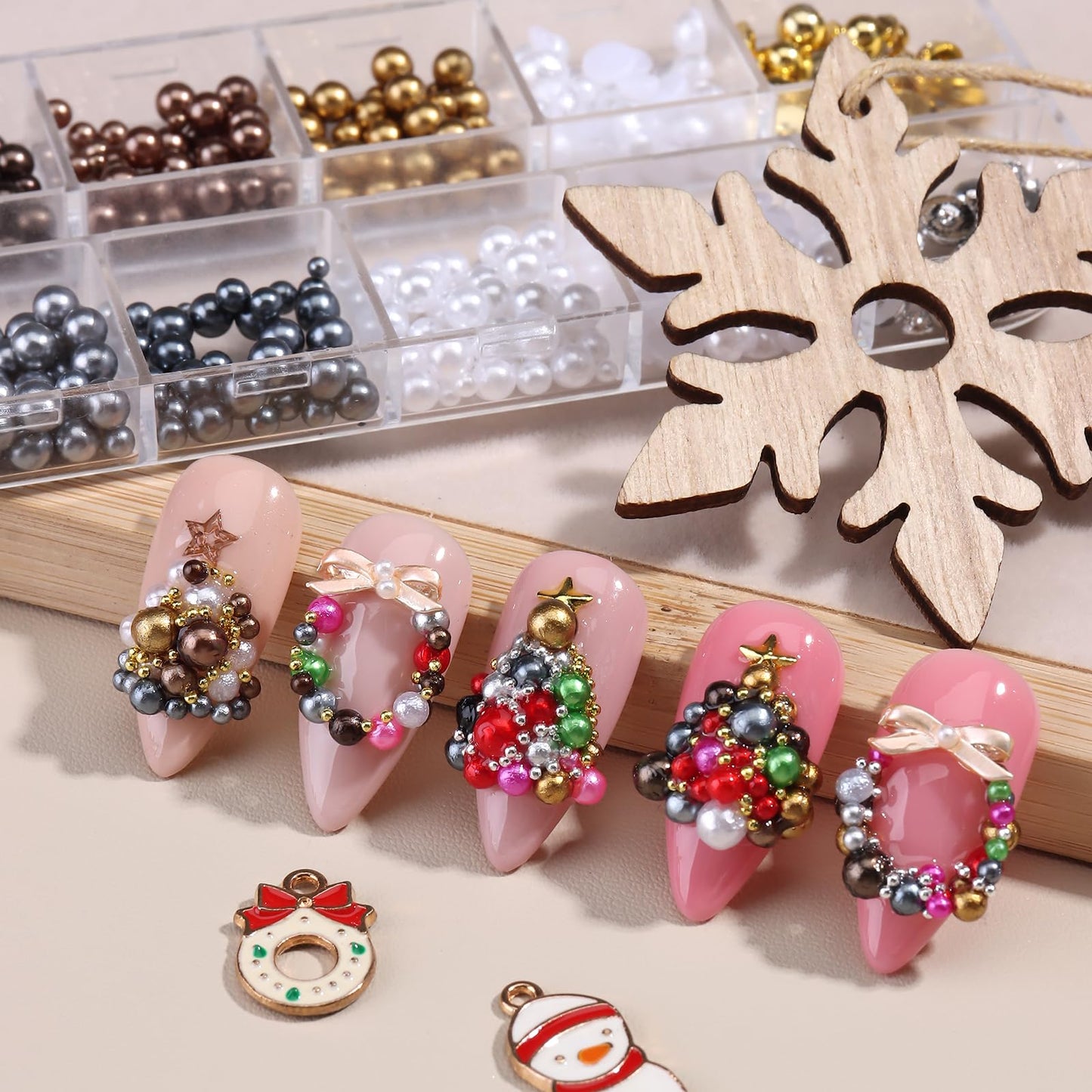 Mixed size round pearls and alloy steel ball studs showcasing different dimensions for DIY crafts