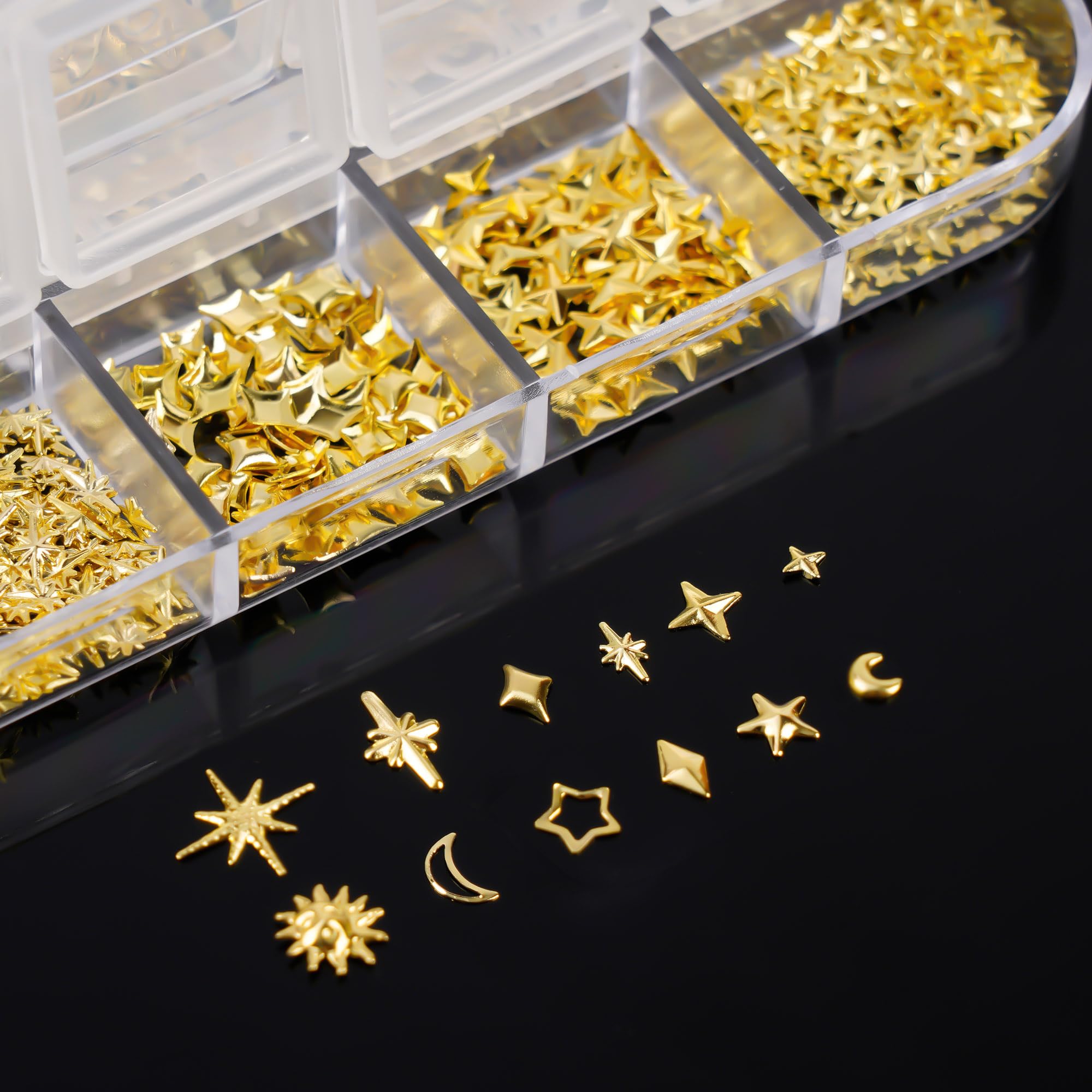 Assorted styles of gold 3D nail charms for DIY manicures