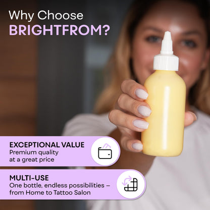 Side angle view of BRIGHTFROM four ounce clear dispenser bottles showing compact travel size dimensions