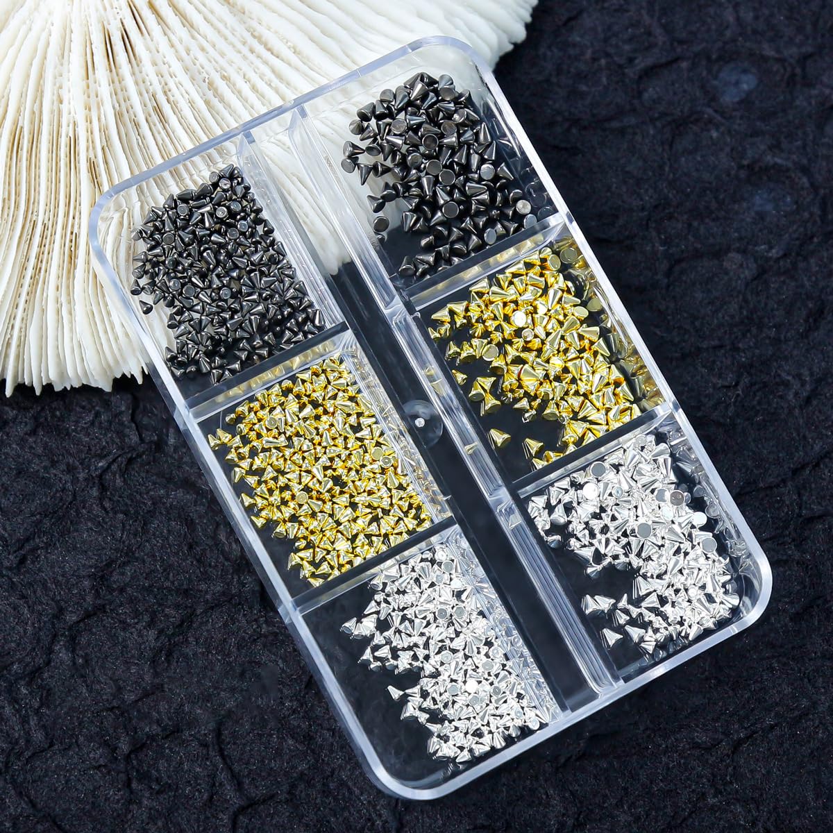 Tatiwoo punk nail art studs organized in grid container