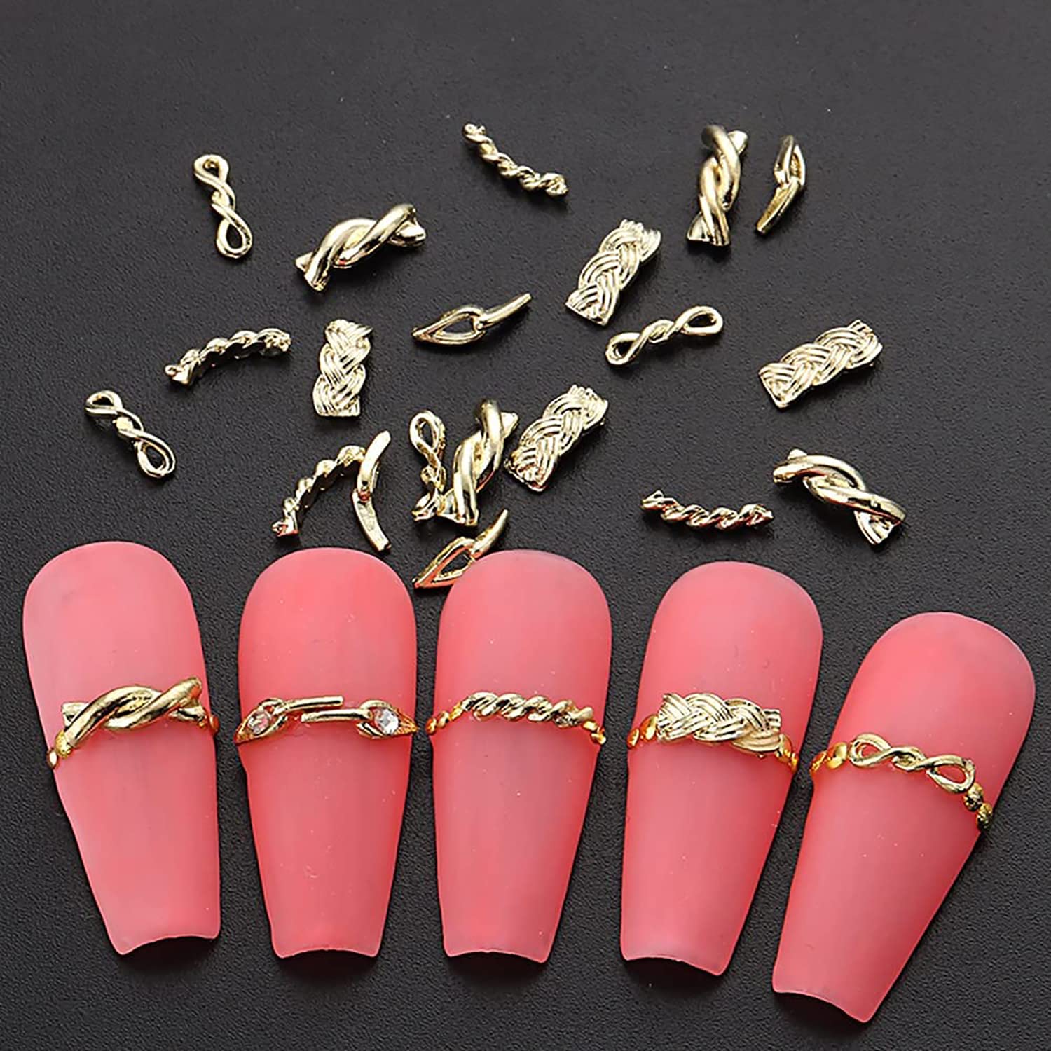 Fifty piece collection of gold metallic nail charms showing the five distinct varieties included in the pack.