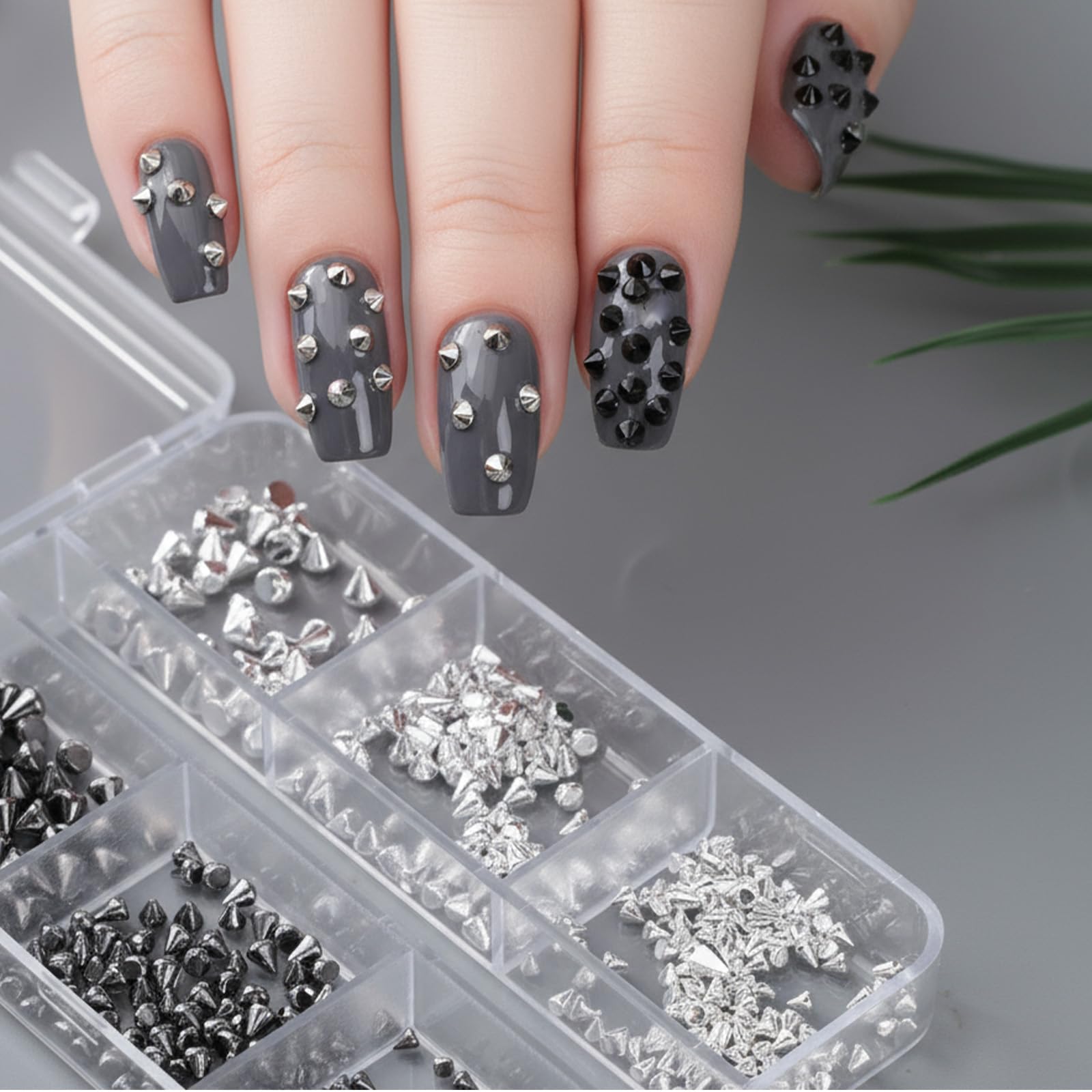 Six grid storage box containing assorted gothic nail rivets