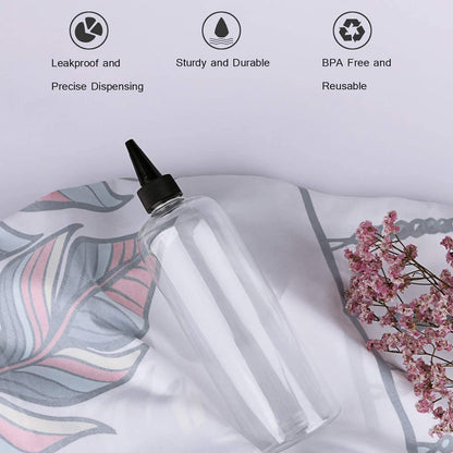 BPA free empty PET plastic applicator bottle standing upright on a clean surface