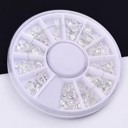 Durable stainless steel alloy ocean series nail studs displayed on a flat surface for DIY manicure sizing.