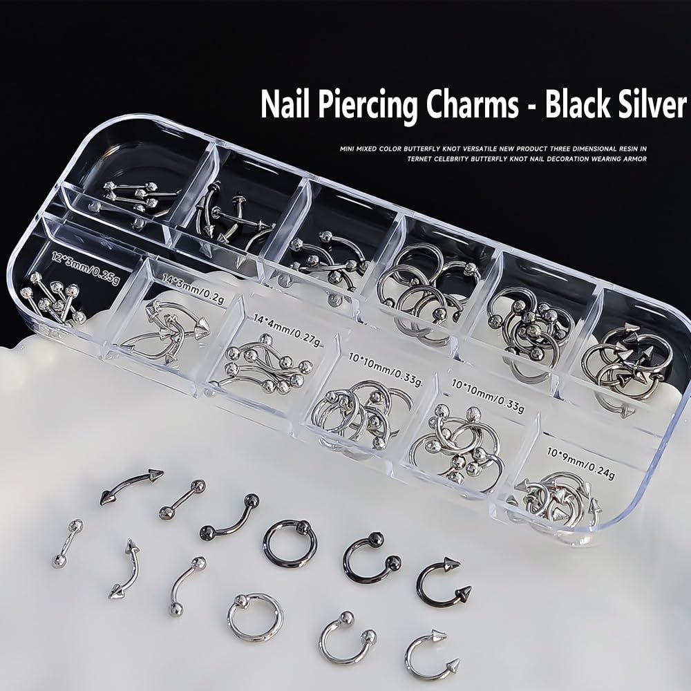 Close up of 6 grid storage box with punk goth nail charms