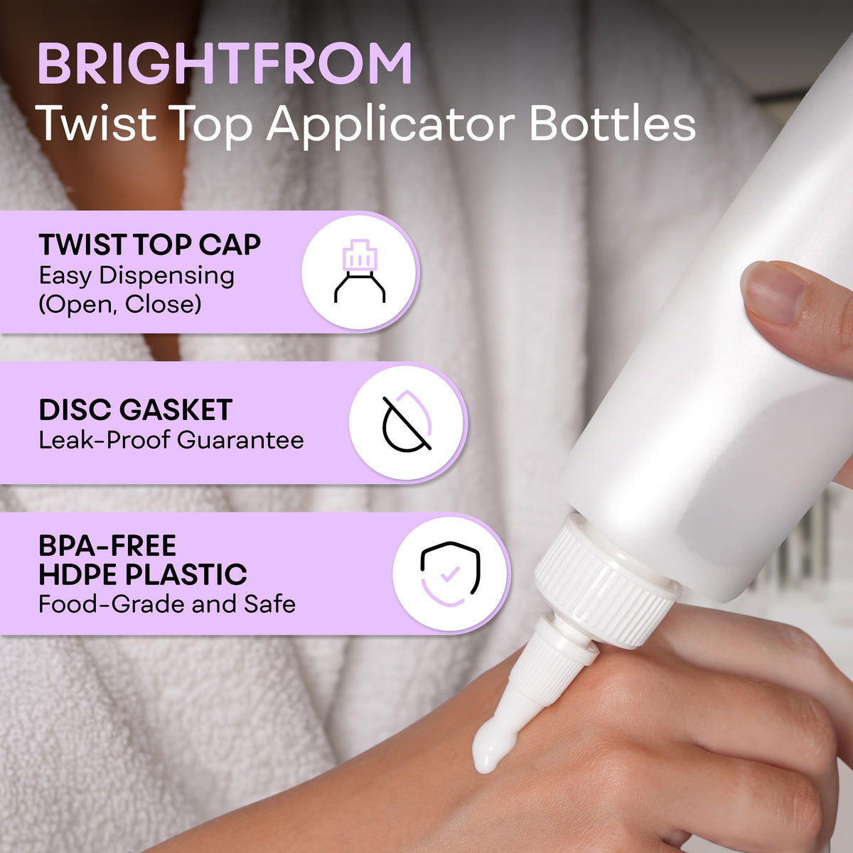 Close up of the black twist open and close nozzle on the empty plastic squeeze bottle