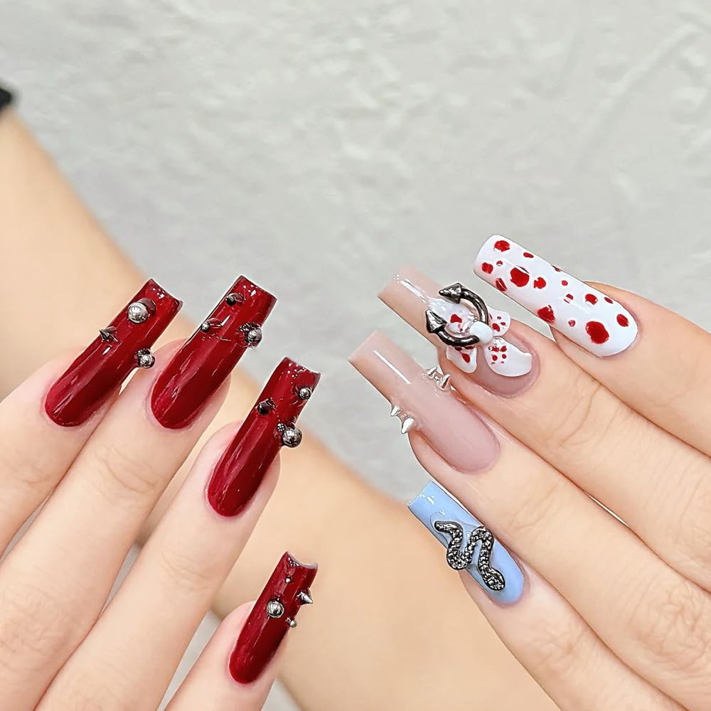 Demonstration of metal piercing charms on artificial nail tips