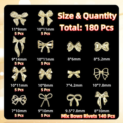 Golden bow nail studs placed on acrylic manicure