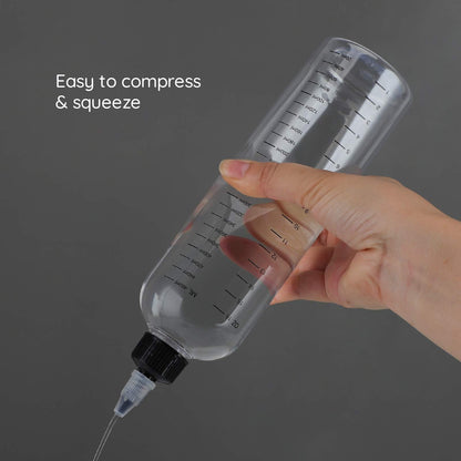Adjustable twist-on top nozzle tip of the hair color applicator displaying leak proof mechanism