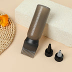 Two pack of black plastic hair coloring squeeze bottles side by side