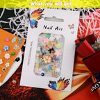 Manicure showcasing floral resin nail charms