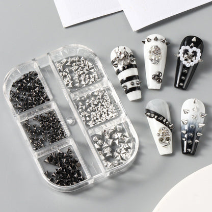 Edgy gothic manicure design example featuring the 3D metal punk spikes and steel beads on acrylic extensions