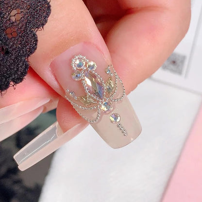 Full view of the SUTOKAKA professional manicure DIY craft kit including case and precision tweezers.