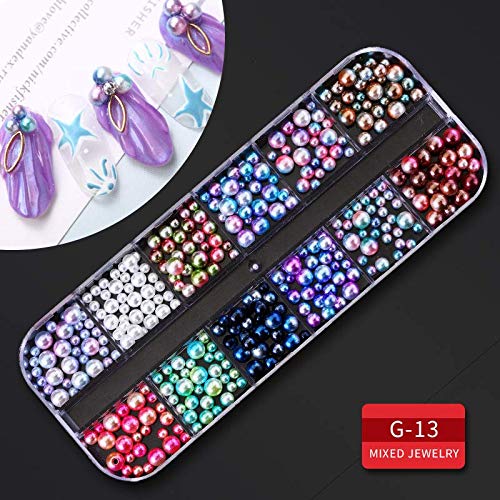 Assorted Artdone flatback pearls and metallic copper studs arranged by design shapes for professional manicure decoration.