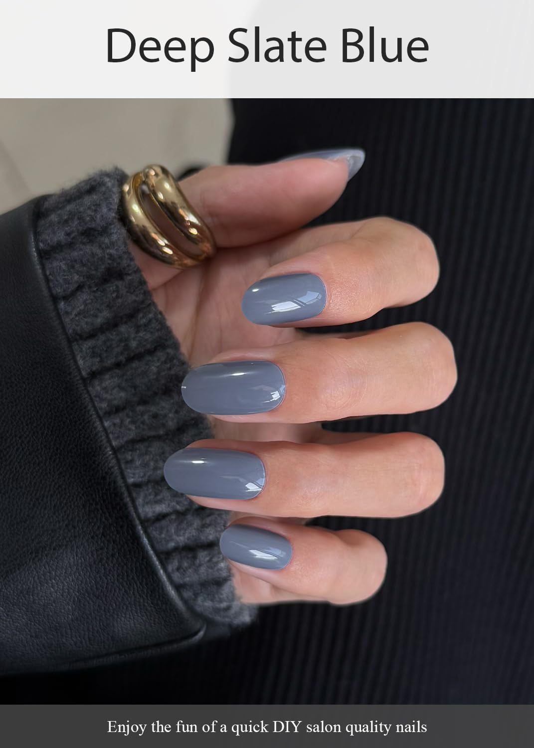 Close up of deep slate blue glossy gel nail wraps on fingernails