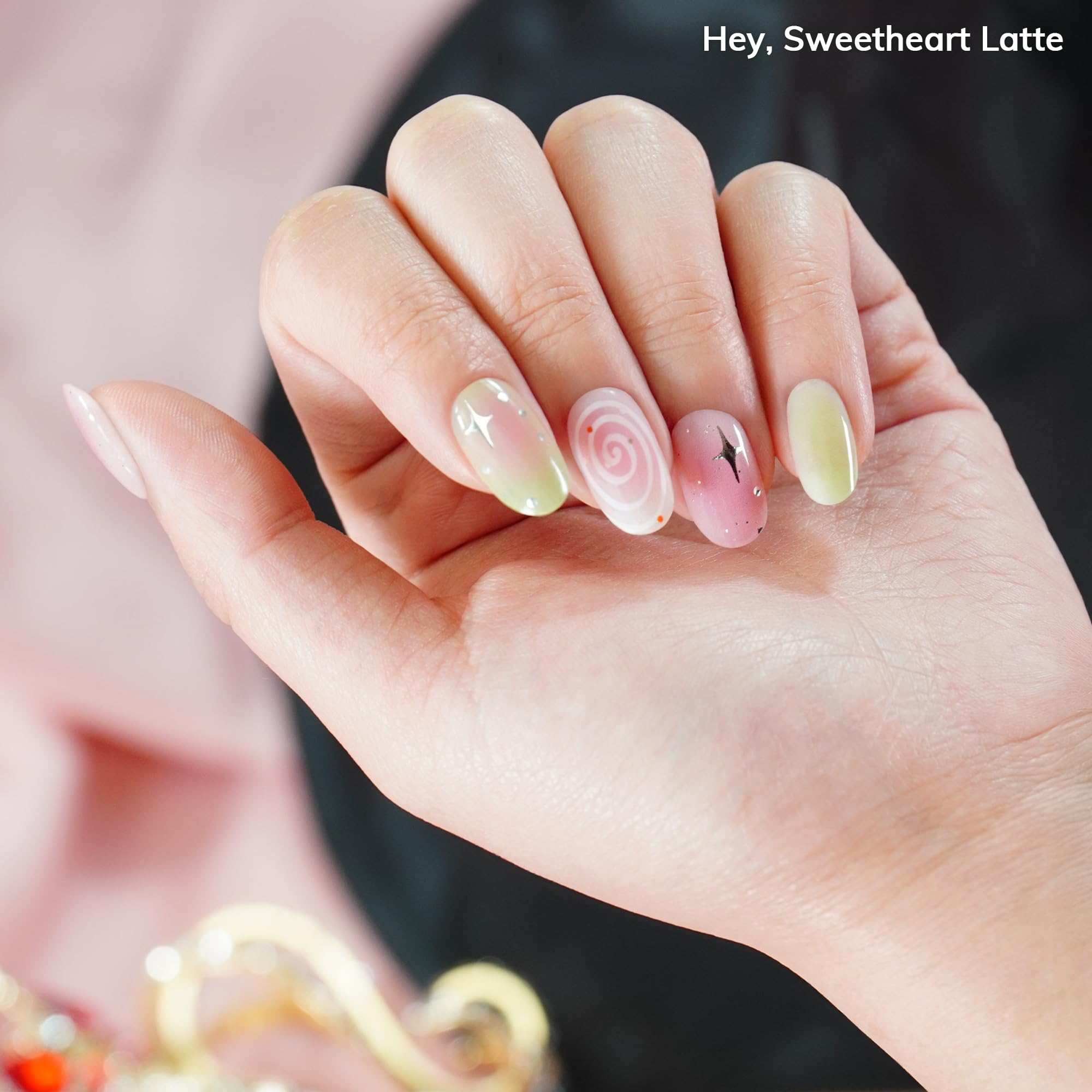 Heyhae gel nail strips design showcasing soft pink and green tones