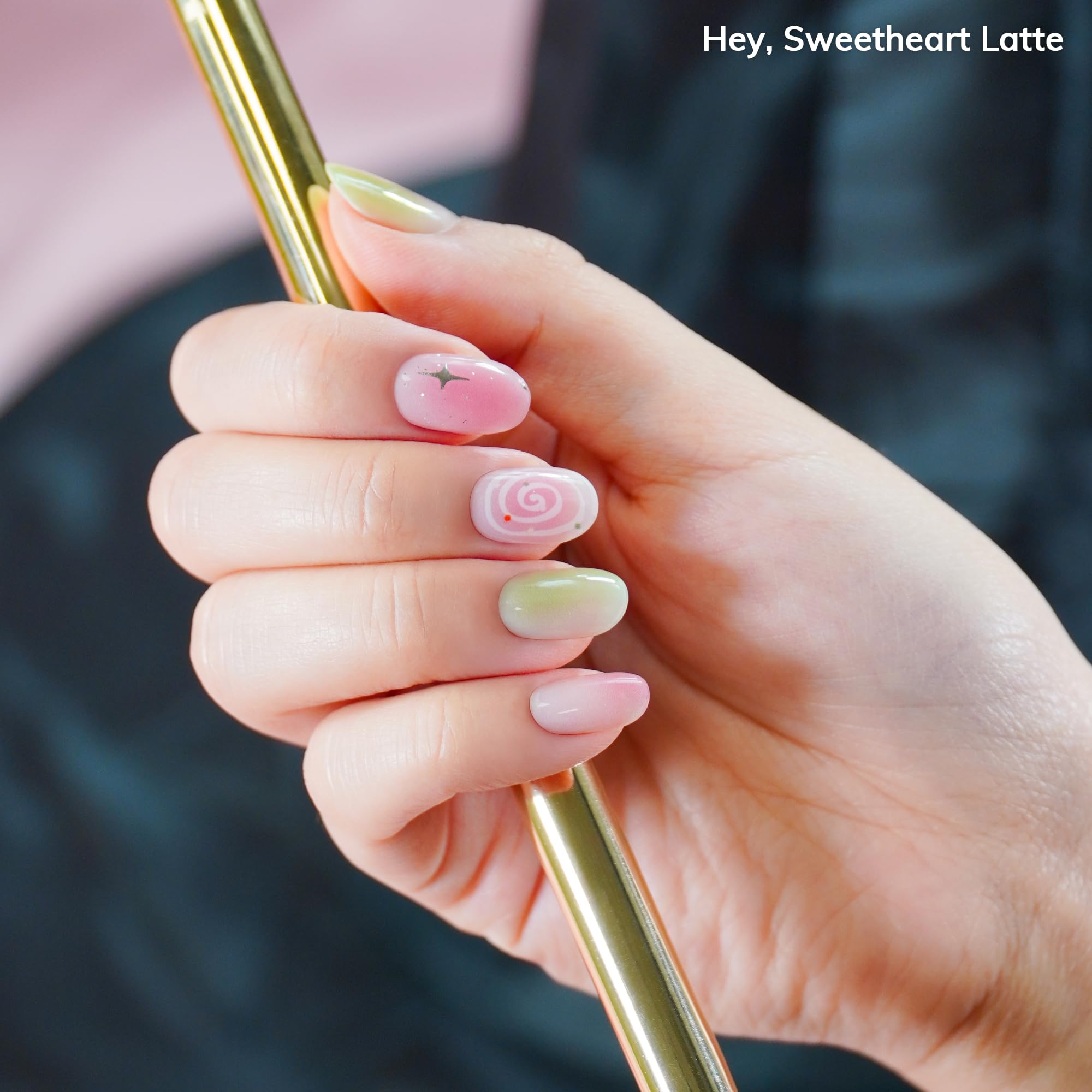 Close-up of Heyhae Sweetheart Latte nail design on fingers