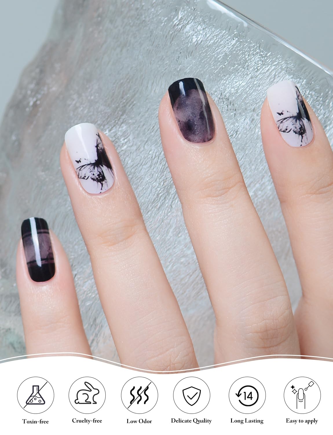 Close up of wine red heart design gel nail wraps
