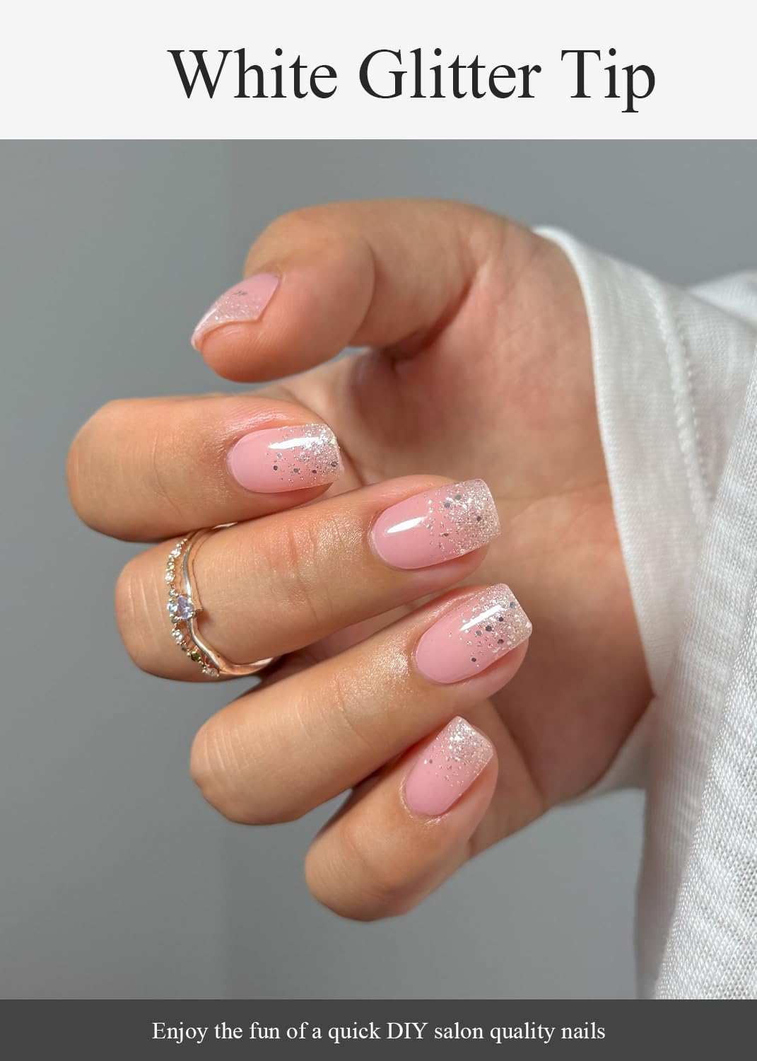 Detailed view of white glitter tip gel nail wraps