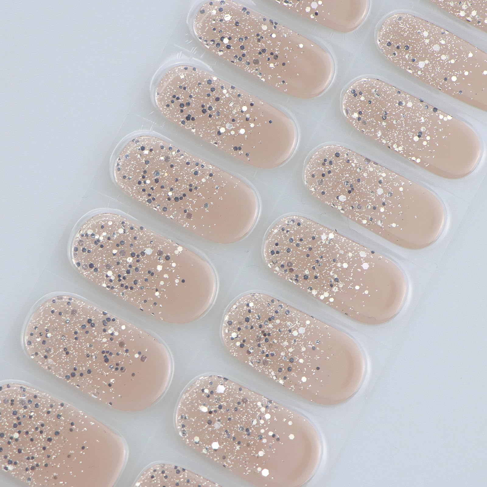 Close up of glitter gel nail sticker texture and finish