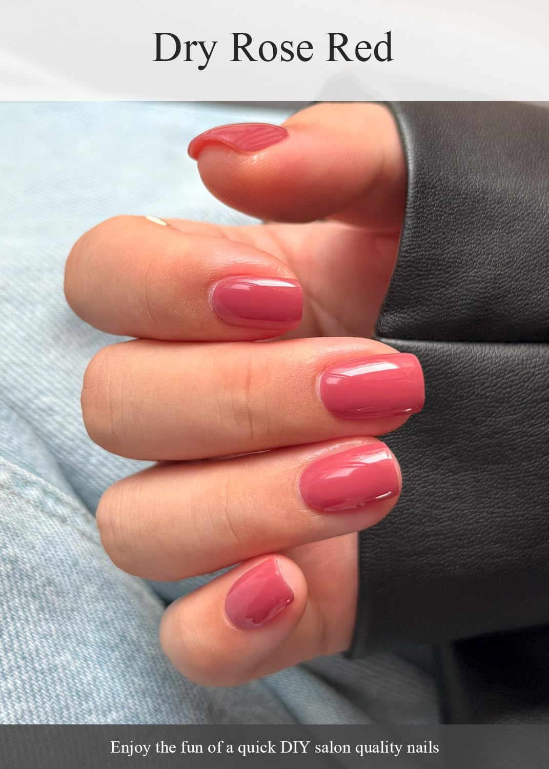 Close up of glossy dry rose red gel nail wraps on hand