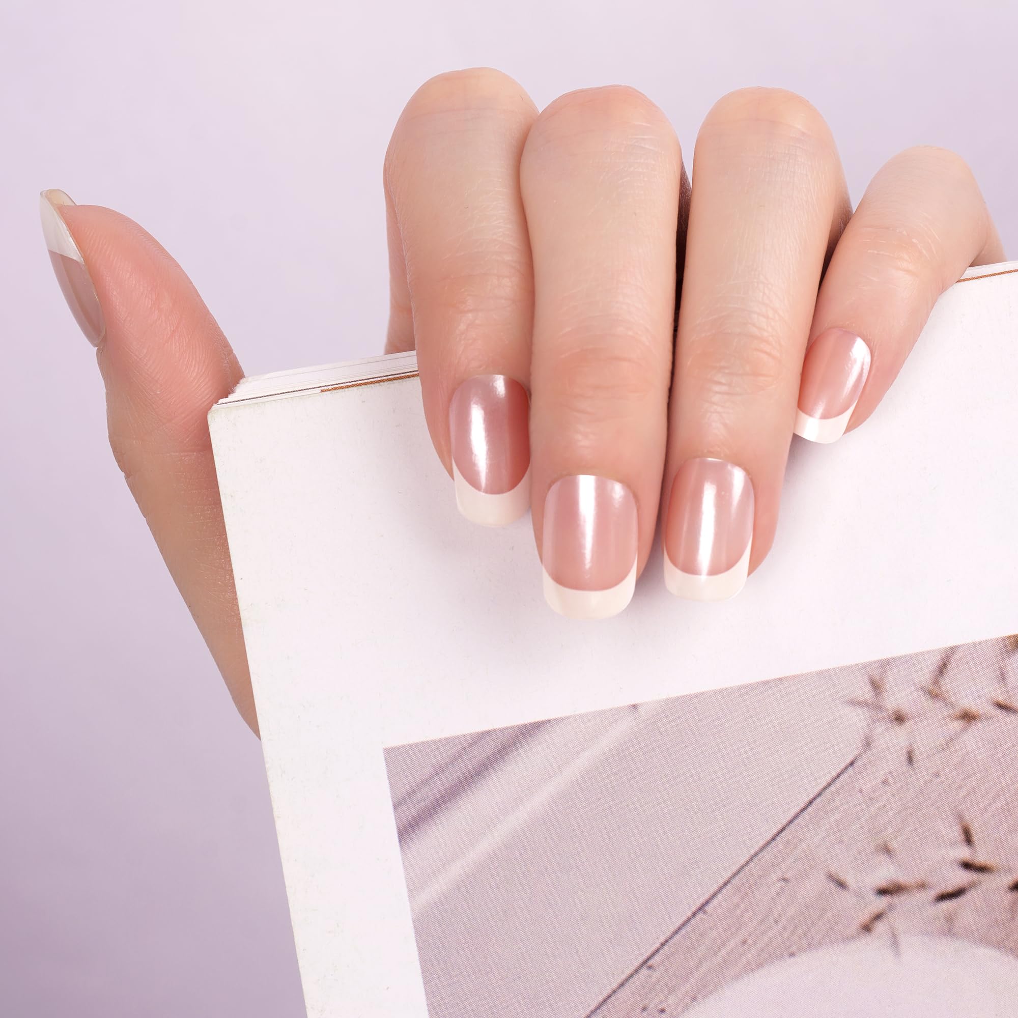 Application of semi cured gel nail strips under UV lamp