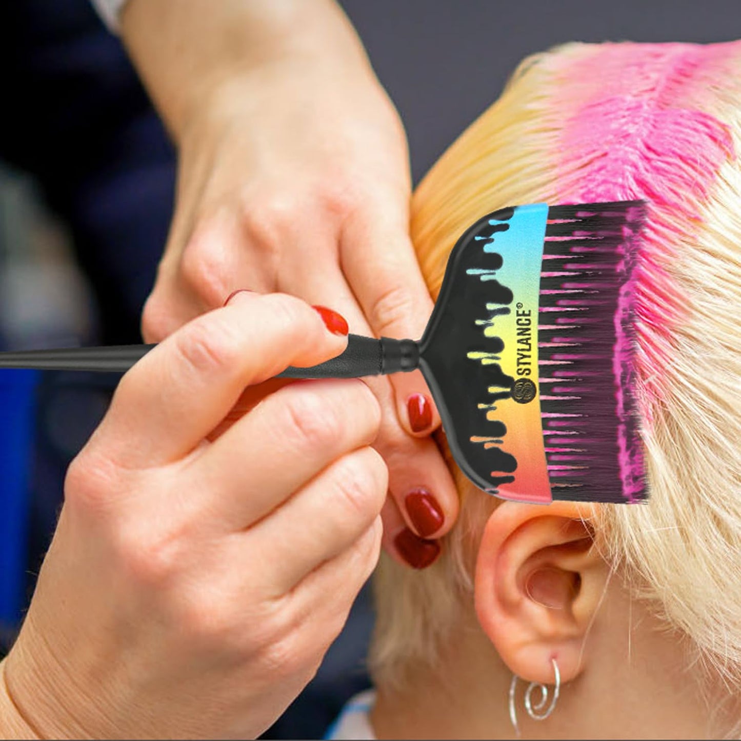 Detailed view of hair stylist brushes for precise root touch ups