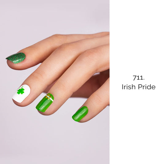 Close up of green shamrock and glitter gel nail designs