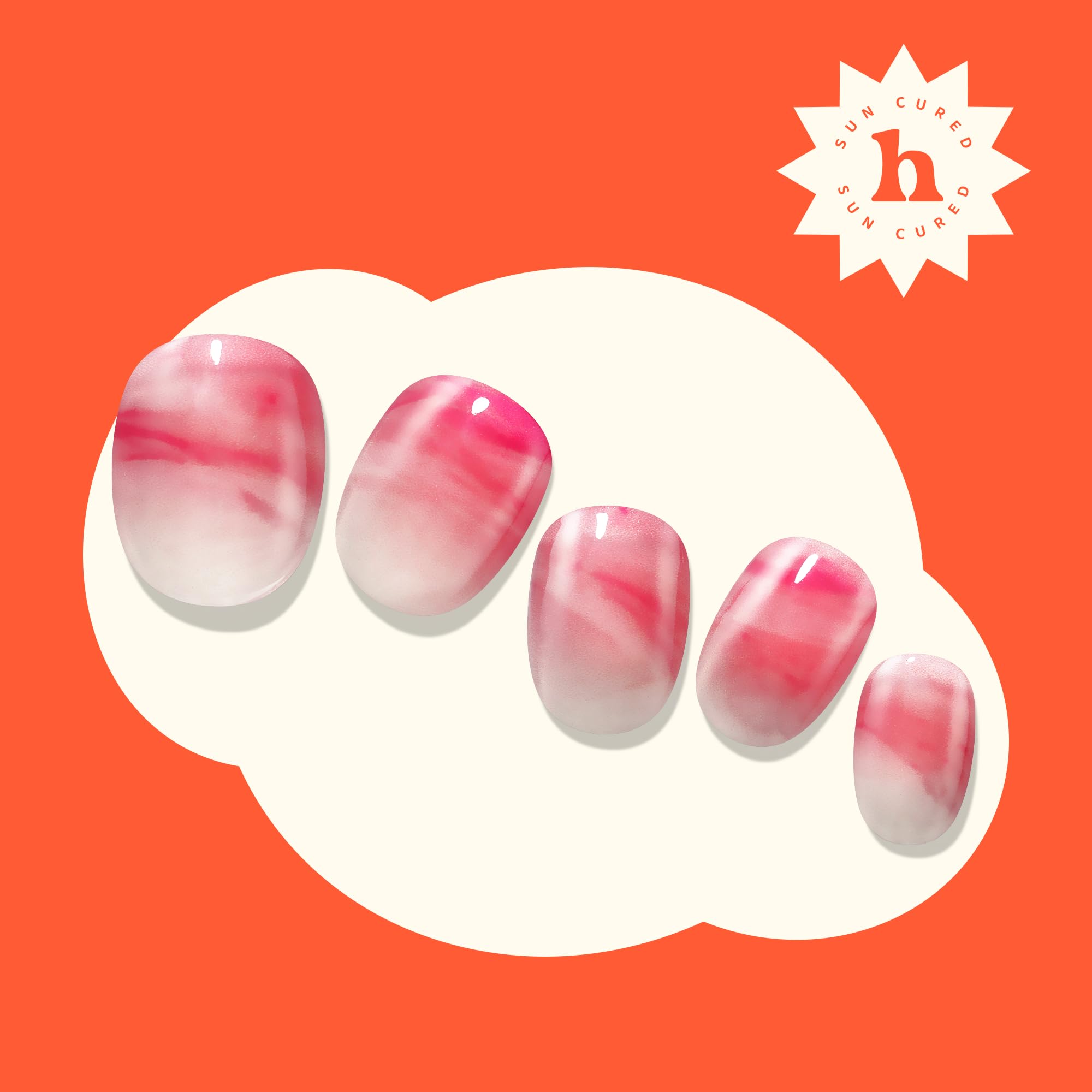 Applying Heyhae gel strips to fingernails for salon quality look