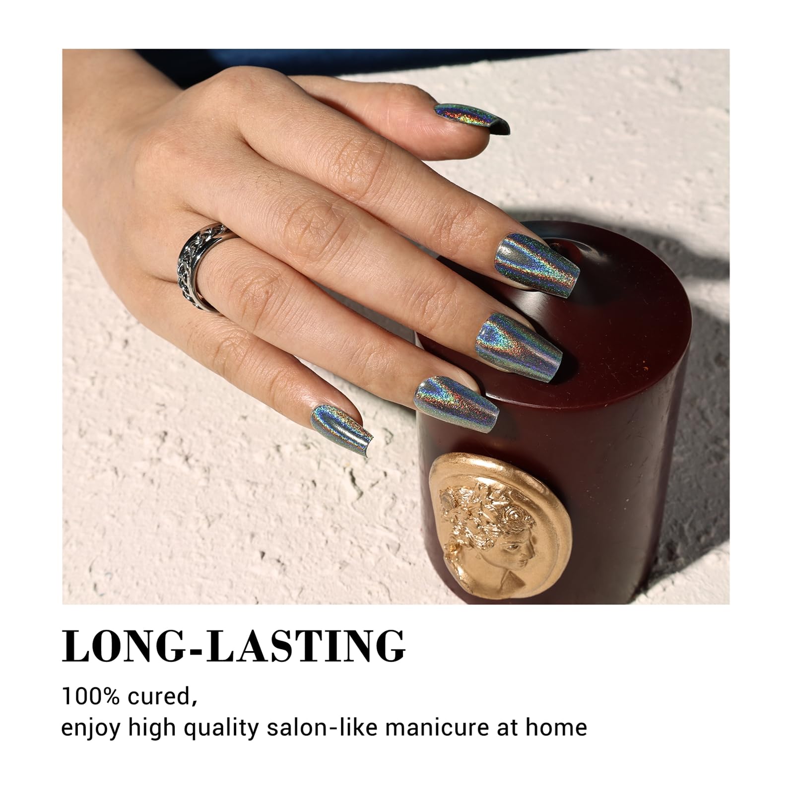 Detailed view of chrome finish MelodySusie gel nail strips on fingernails