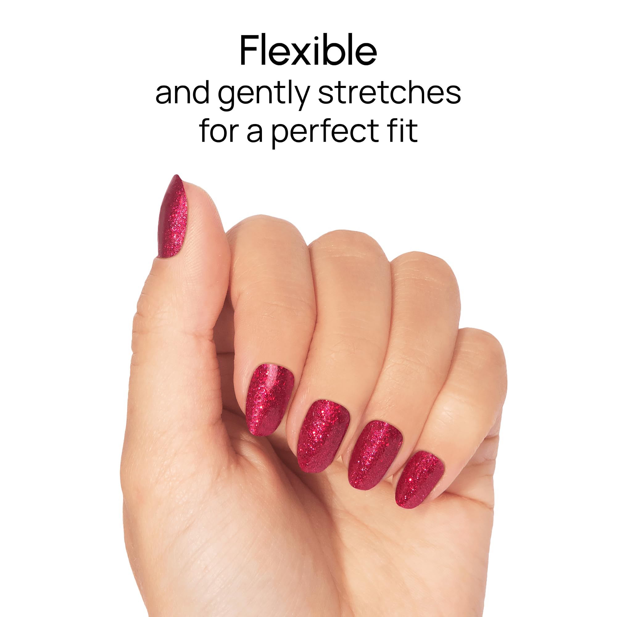 Hands displaying salon-quality red glitter manicure with Color Street