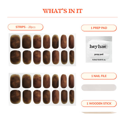 Contents of Heyhae nail kit including prep pad and file