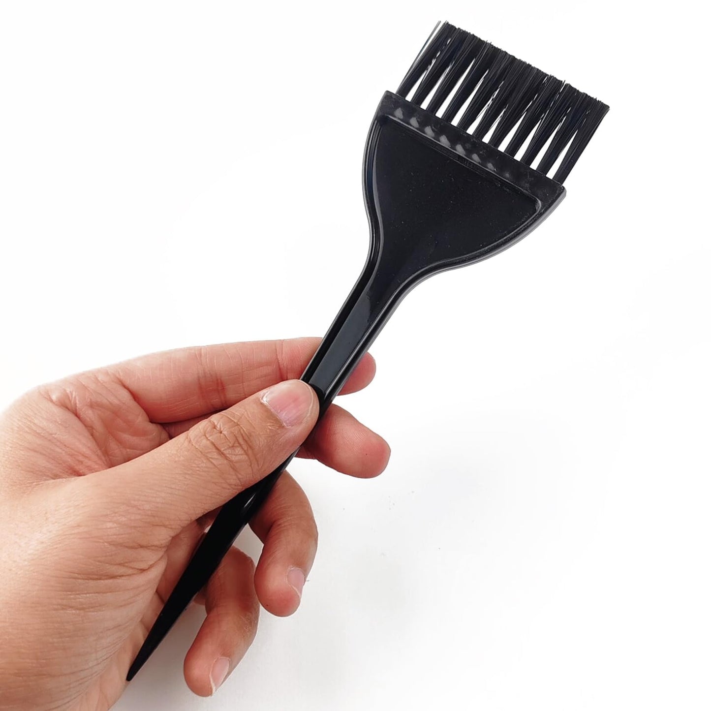 Black plastic hair tint applicator brushes for home dye