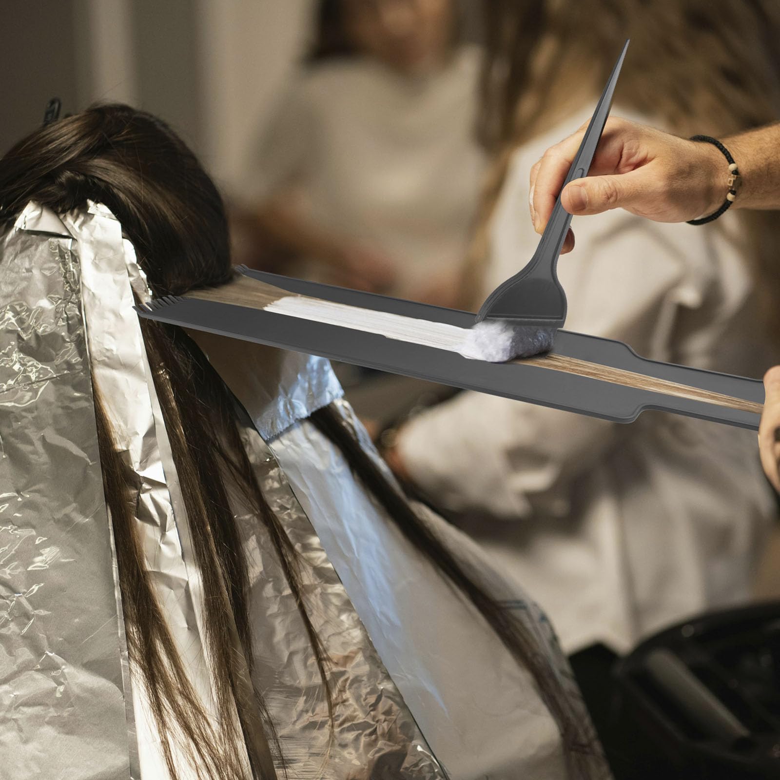 Ergonomic grip design of the OXDFK balayage highlighting paddle