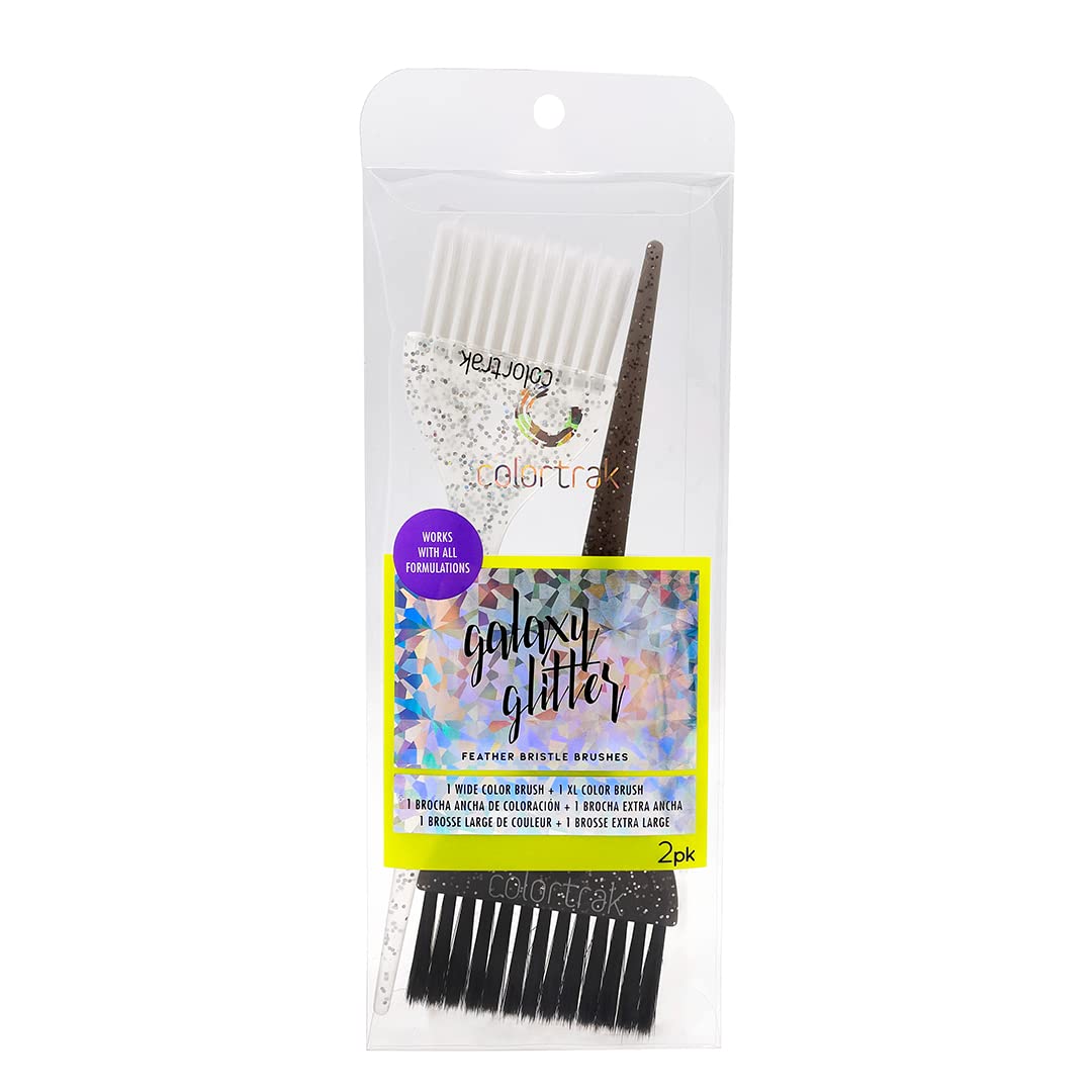Professional hairstylist using Colortrak Galaxy brushes for highlighting