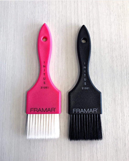 Stylist using Framar brush for precise hair color blending