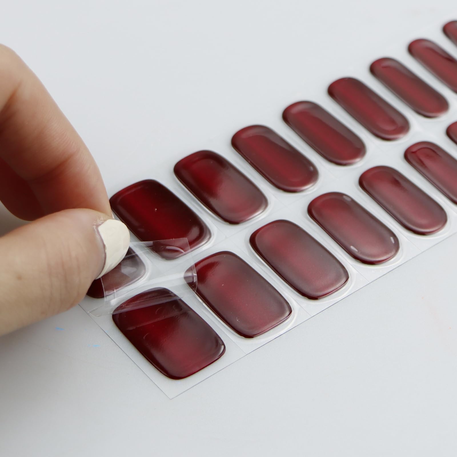 Model showing finished cat eye gel manicure