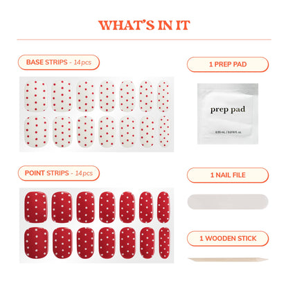 Close up of red and white polka dot gel nail strips design