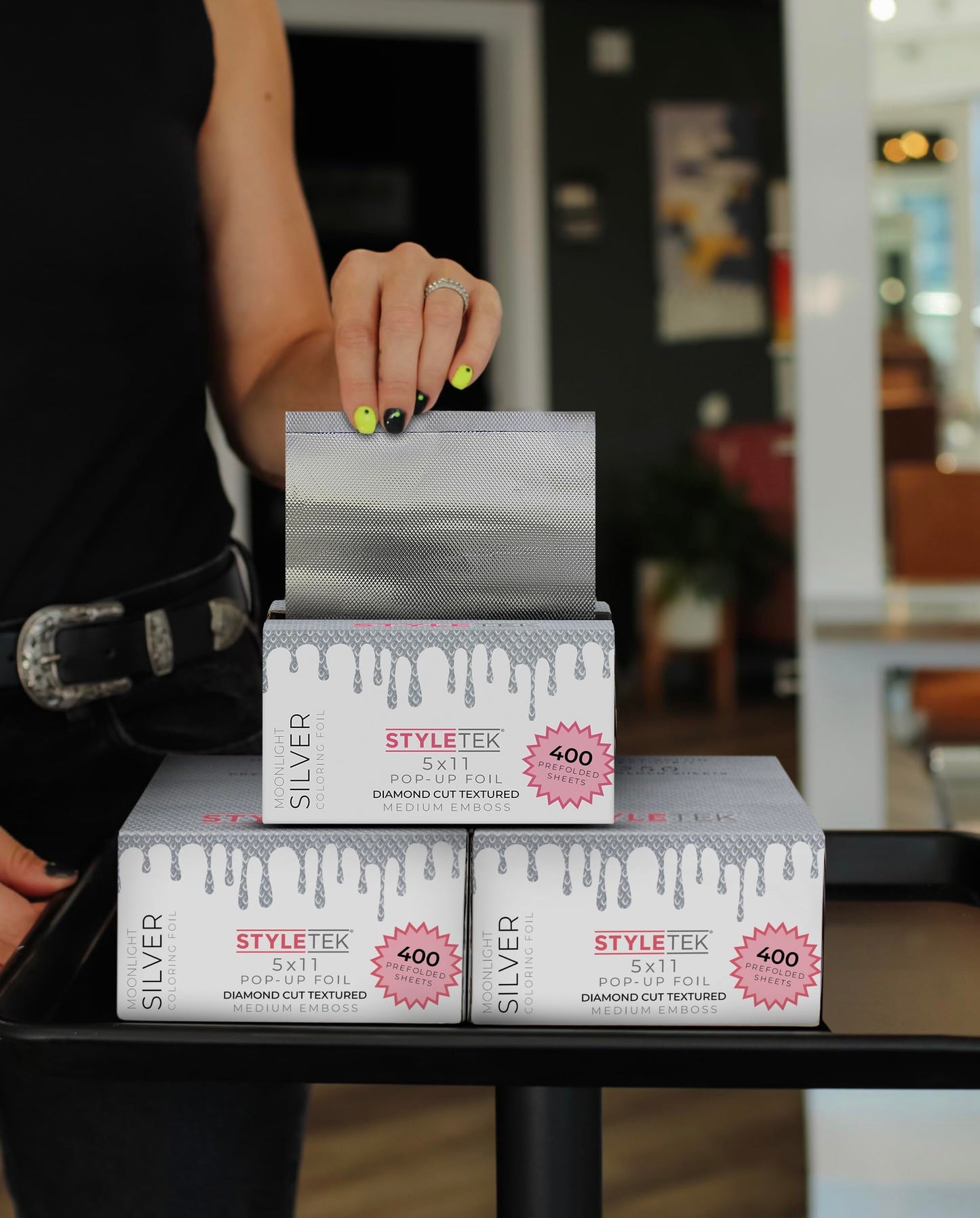 Stack of professional diamond embossed hair foils from Styletek