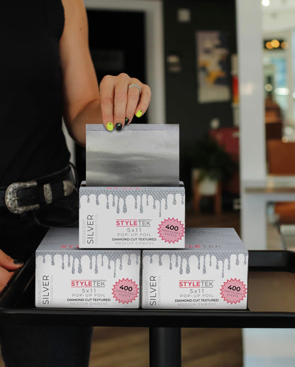 Stack of professional diamond embossed hair foils from Styletek
