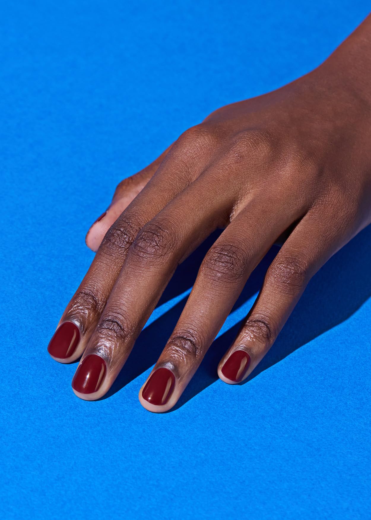 Model showing application of Ohora N Classic Burgundy strips