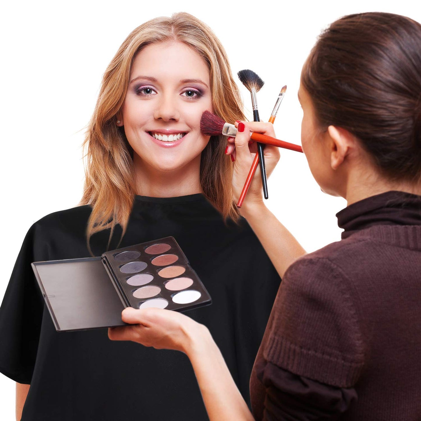 Syhood salon cape showing adjustable hook and loop neck fastener