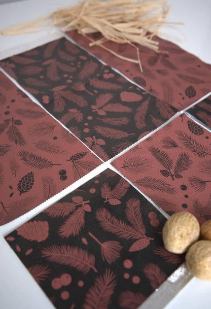 Close up of botanical pine cone pattern on salon hair foil