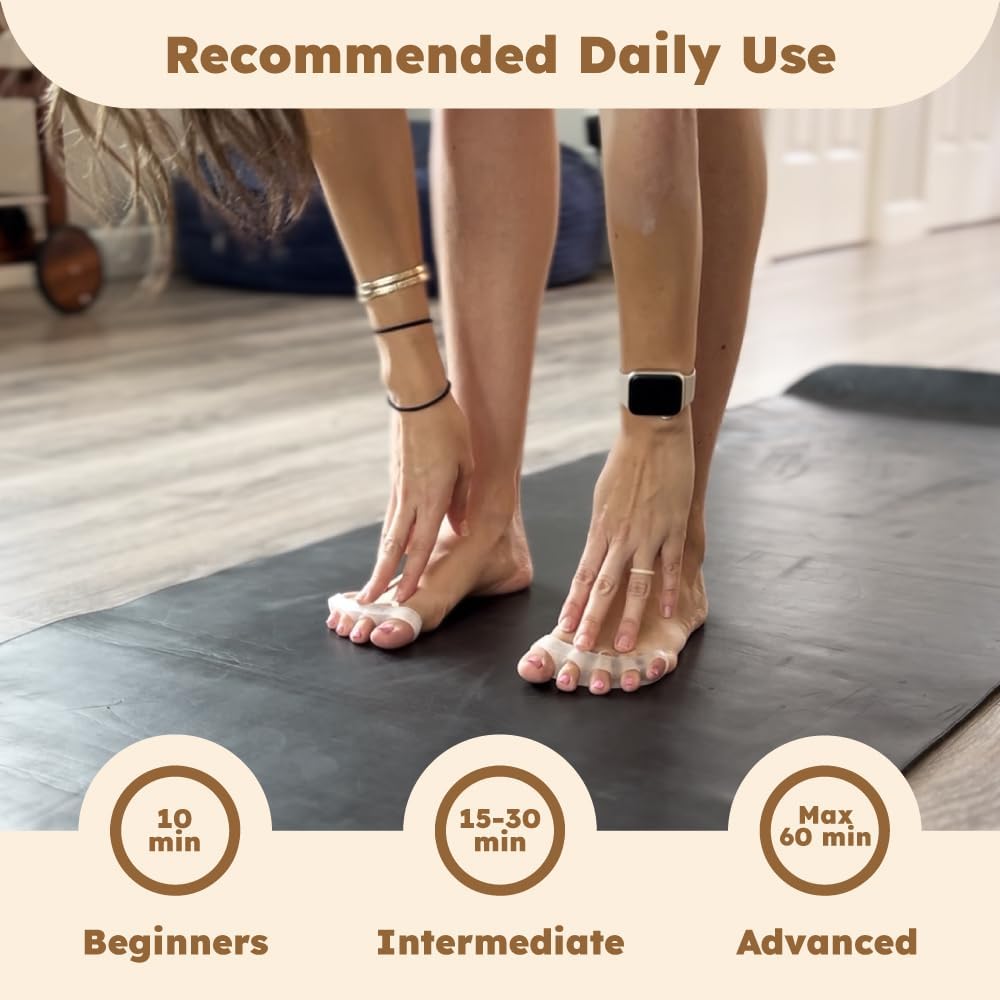Two pairs of Yogabody rubber toe stretchers on white background
