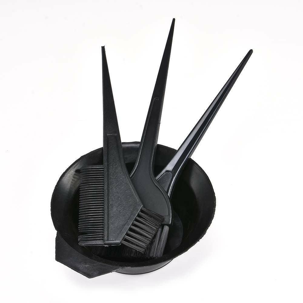 The twin-headed comb-brush from the MSQ hairdressing set highlighting its dual-purpose design.