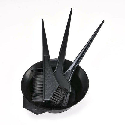 The twin-headed comb-brush from the MSQ hairdressing set highlighting its dual-purpose design.