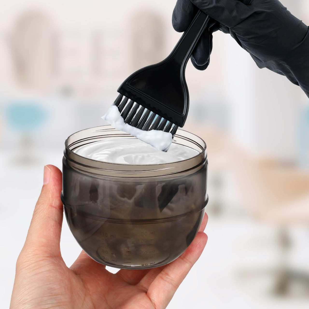 Mipcase hair dye cup close up highlighting the clear double scale volumetric measurements for precise developer blending