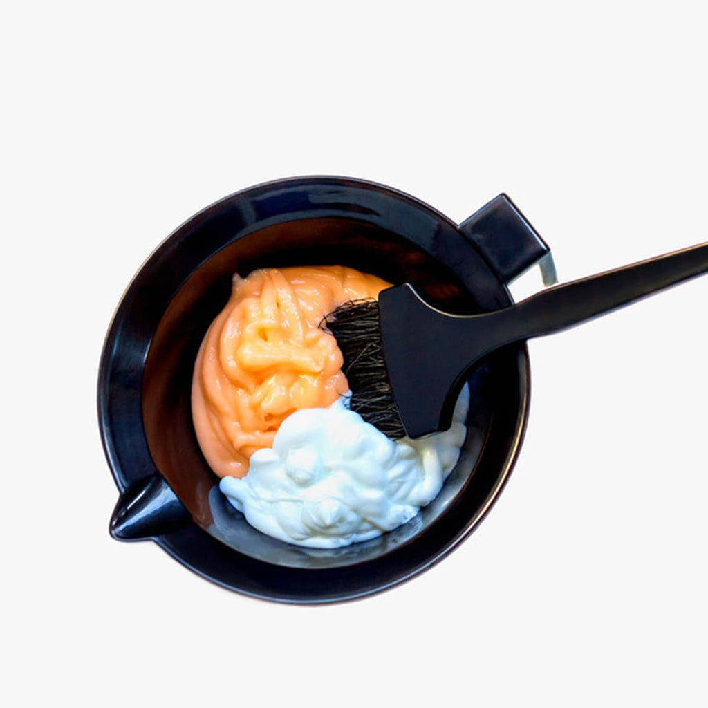 Four pieces of Beaupretty plastic hair bleach mixing bowls stacked together.